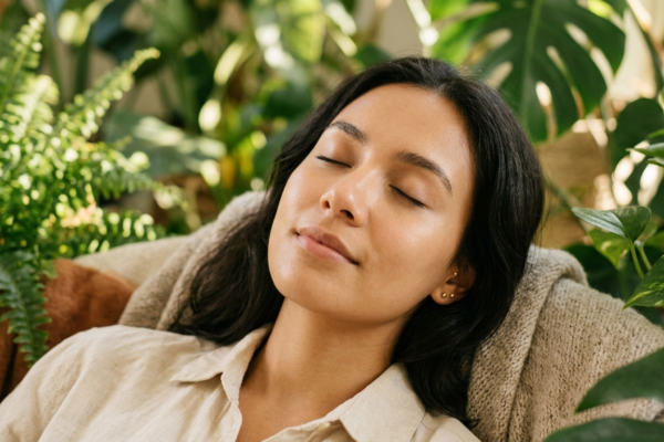 Woman with calm glowing skin after managing stress — illustrating the link between stress and skin health